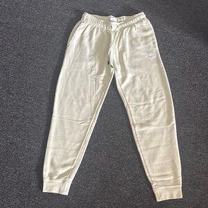 Nike Light Green Sweatpants with Elastic Waistband and Tapered Legs